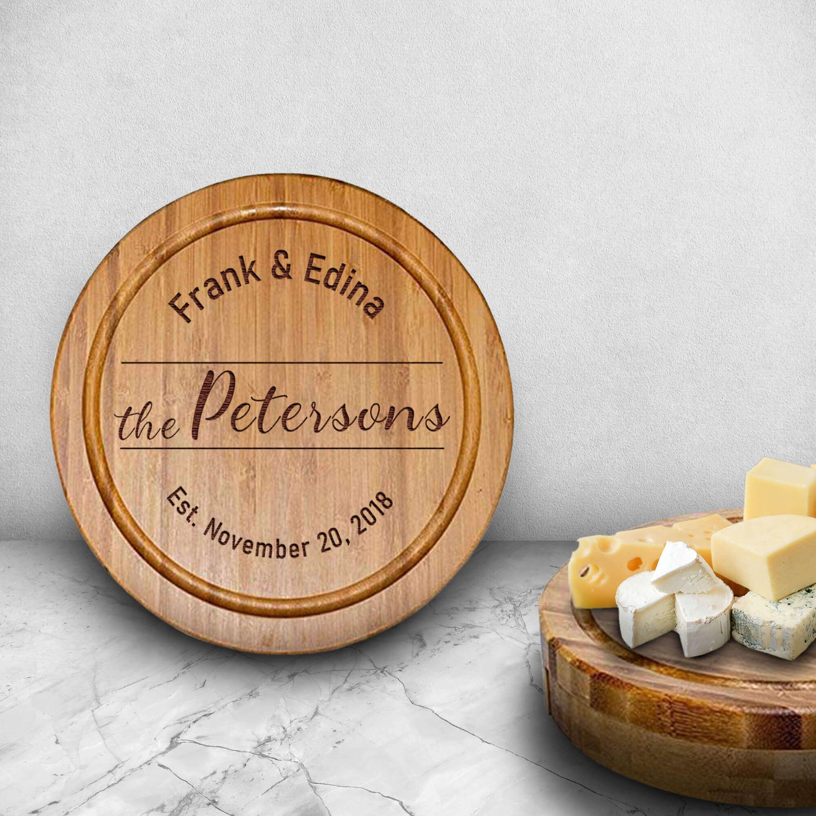 Impress your hosts with our unique housewarming gifts, including a stylish cheese board and knife set, engraved serving trays, and charcuterie platter ideas.