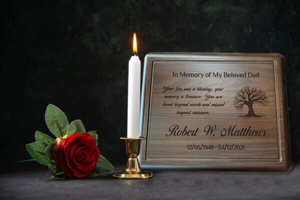 "Memorial for Dad" - A photo of a plaque with the words "In Loving Memory of Dad" engraved on it.