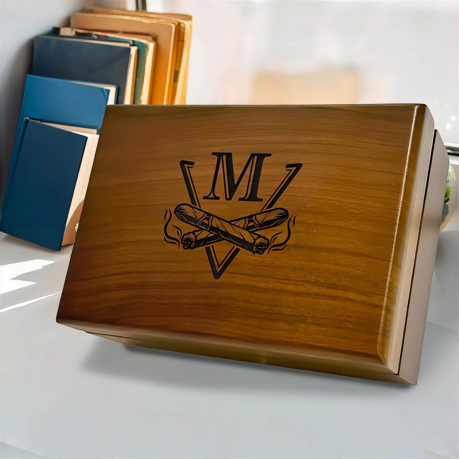 Personalized cigar box with engraved initials.