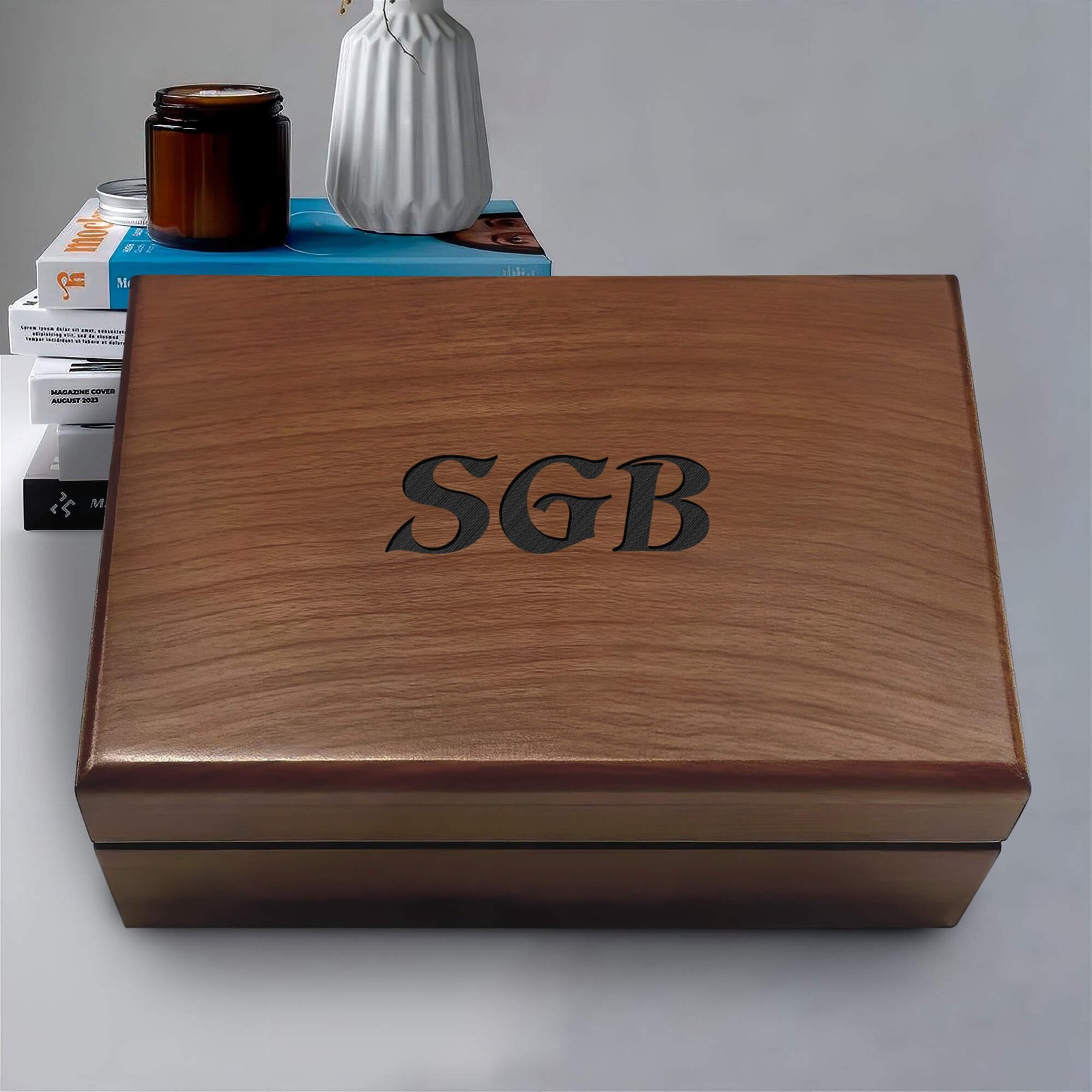 Engraved wooden box featuring a personalized name on the lid, ideal for storage or as a gift.