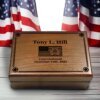 A distinguished army retirement gift, including a personalized plaque and military symbols, celebrating a career of commitment.